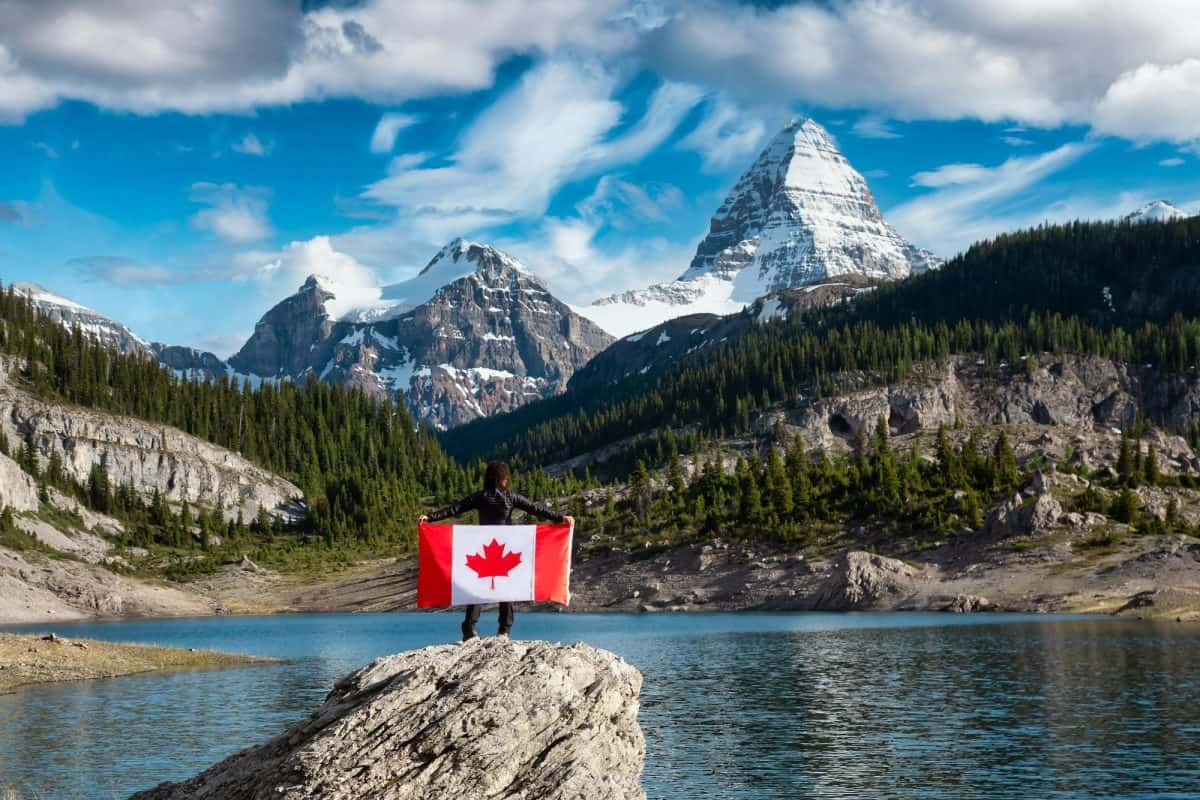 Girl holding a Canadian national flag